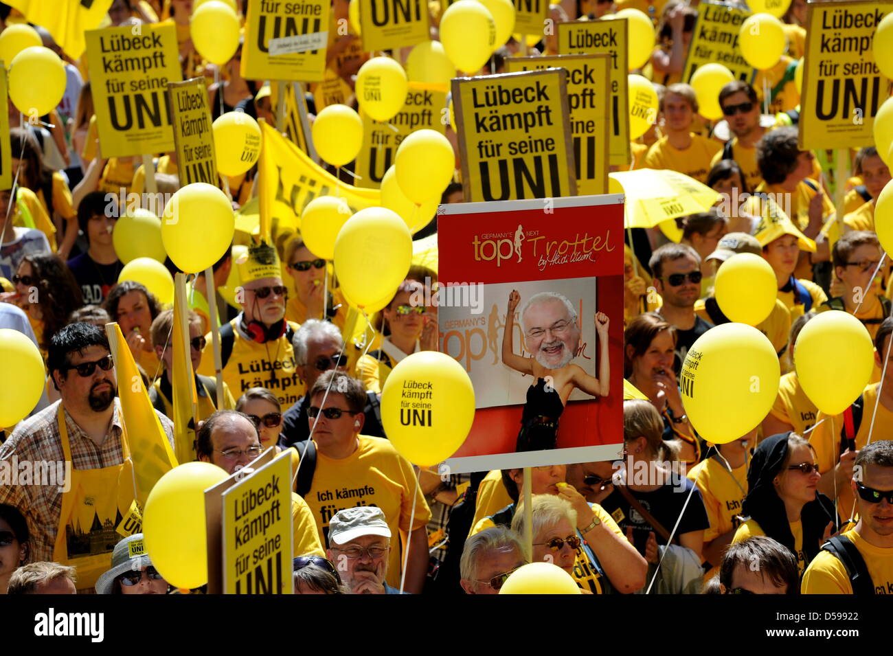 A total of 14,000 students and university staff members protest against the austerity package of Germany's ruling coalition in Kiel, Germany, 16 June 2010. A police spokesperson states 'this is the biggest protest in 30 years.' Protestors from university cities Kiel, Luebeck and Flensburg gathered to protest against the planned annihilation of Luebeck's course of medicne stdies. Ph Stock Photo