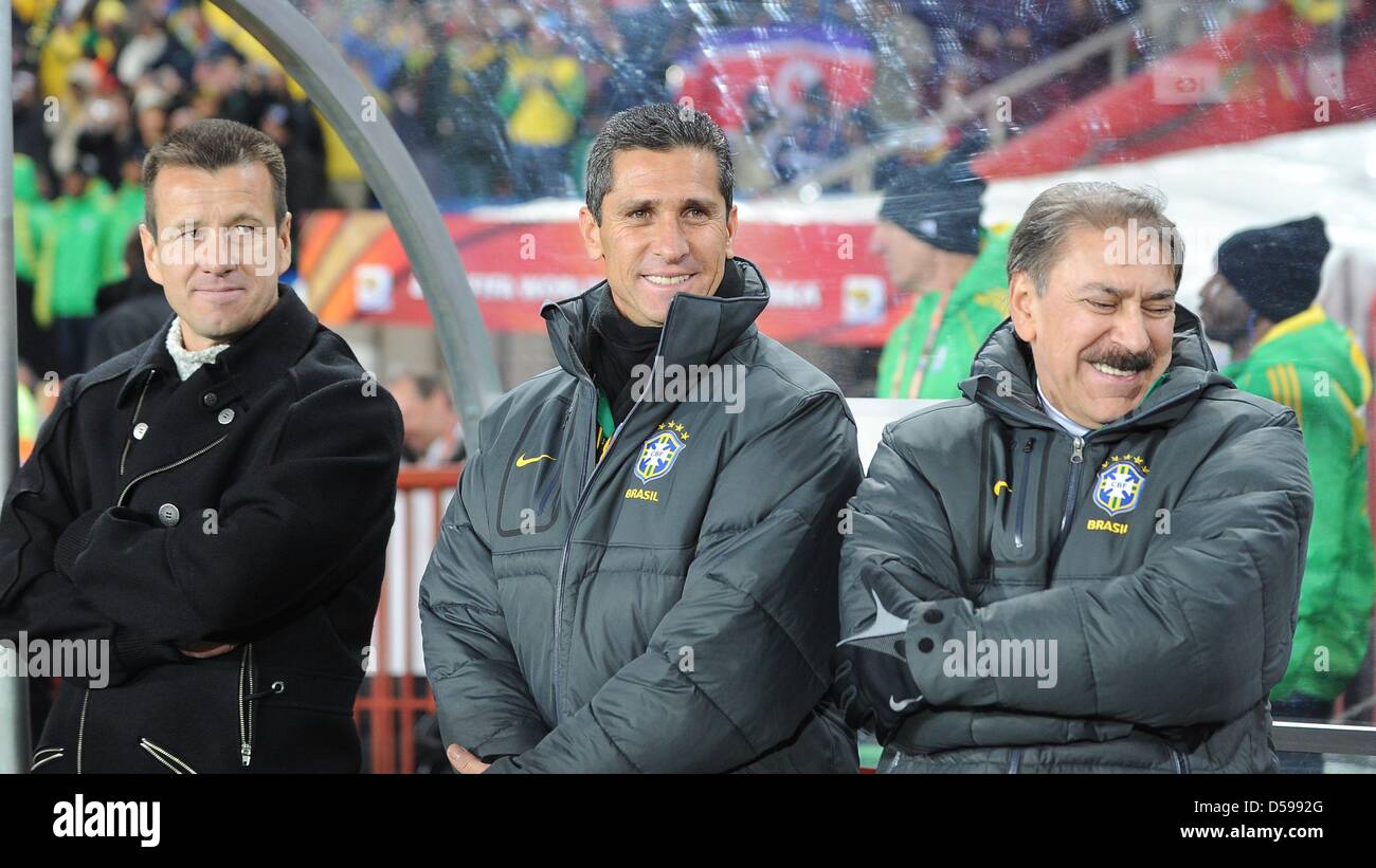 Brazil's coach Dunga (L) and his assistant coach Jorginho (C) on the ...