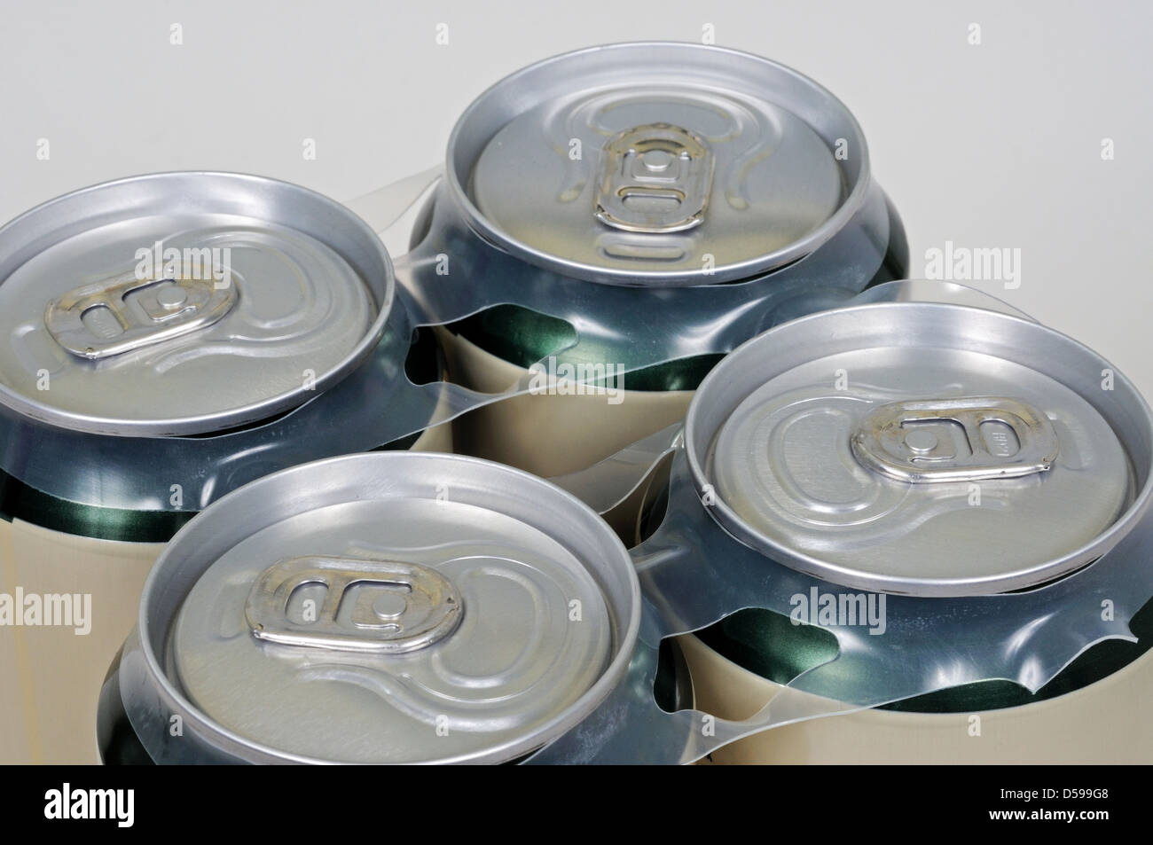 Unopened drinks can lids. Stock Photo
