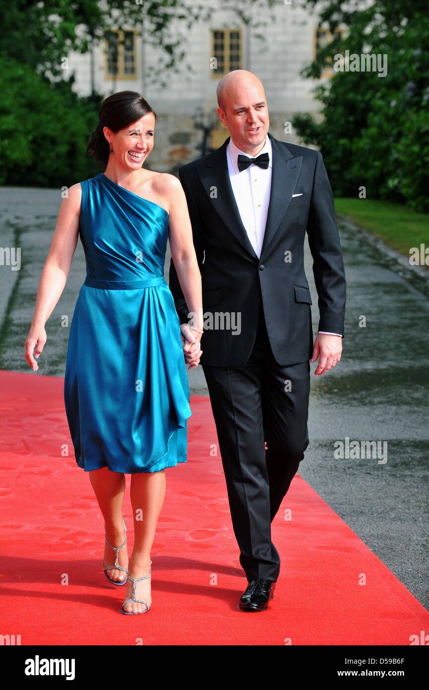 The Swedish Prime Minister Fredrik Reinfeldt and his wife Filippa arrive for the goverment dinner held at the Eric Ericson Hall on Skeppsholmen, one of the islands of Stockholm, on the occasion of the wedding of Crown Princess Victoria of Sweden and Daniel Westling in Stockholm, Sweden, 18 June 2010. The royal wedding ceremony of Crown Princess Victoria of Sweden and Daniel Westlin Stock Photo