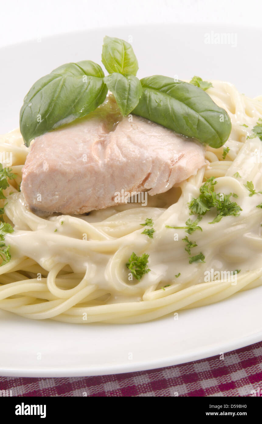steamed salmon fillet and spaghetti with cheese sauce Stock Photo - Alamy