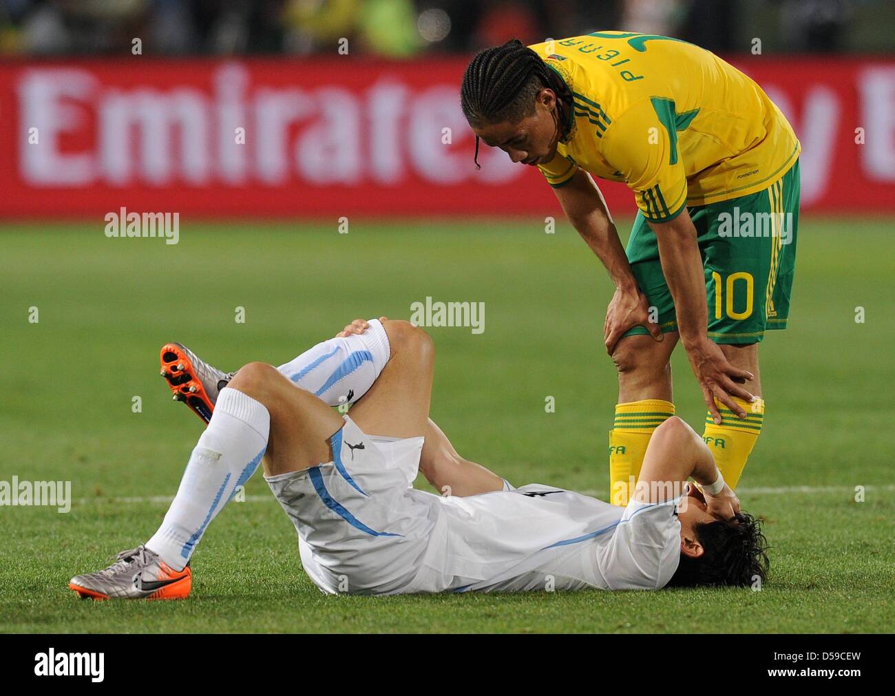 Uruguay's Jorge Fucile gets to the ground during the 2010 FIFA World Cup group A match between South Africa and Uruguay at Loftus Versfeld Stadium in Pretoria, South Africa 16 June 2010. Photo: Achim Scheidemann - Please refer to http://dpaq.de/FIFA-WM2010-TC Stock Photo