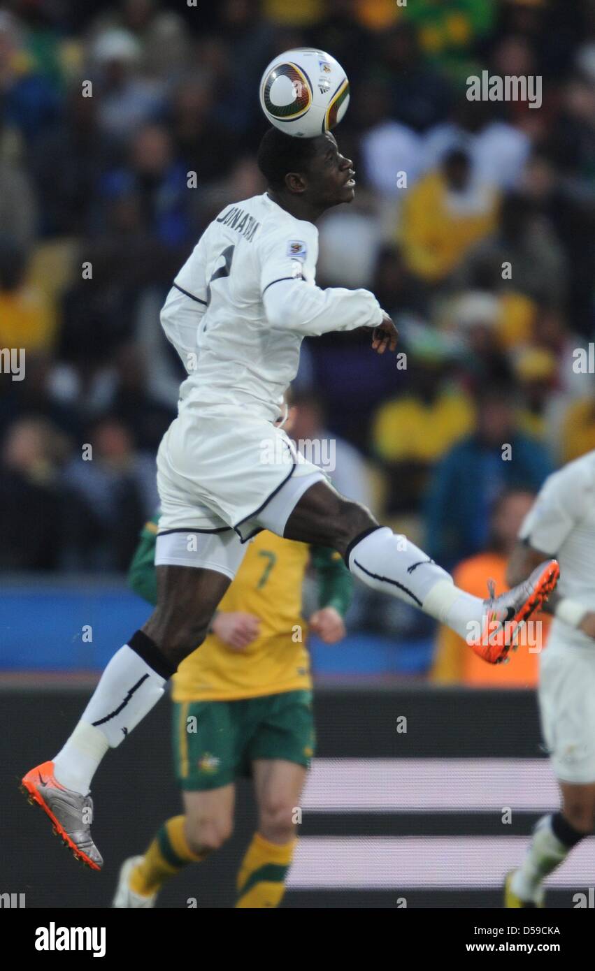 Ghana's Asamoah Gyan heads the ball during the 2010 FIFA World Cup group D match between Ghana and Australia at the Royal Bafokeng Stadium in Rustenburg, South Africa 19 June 2010. Photo: Achim Scheidemann - Please refer to http://dpaq.de/FIFA-WM2010-TC Stock Photo