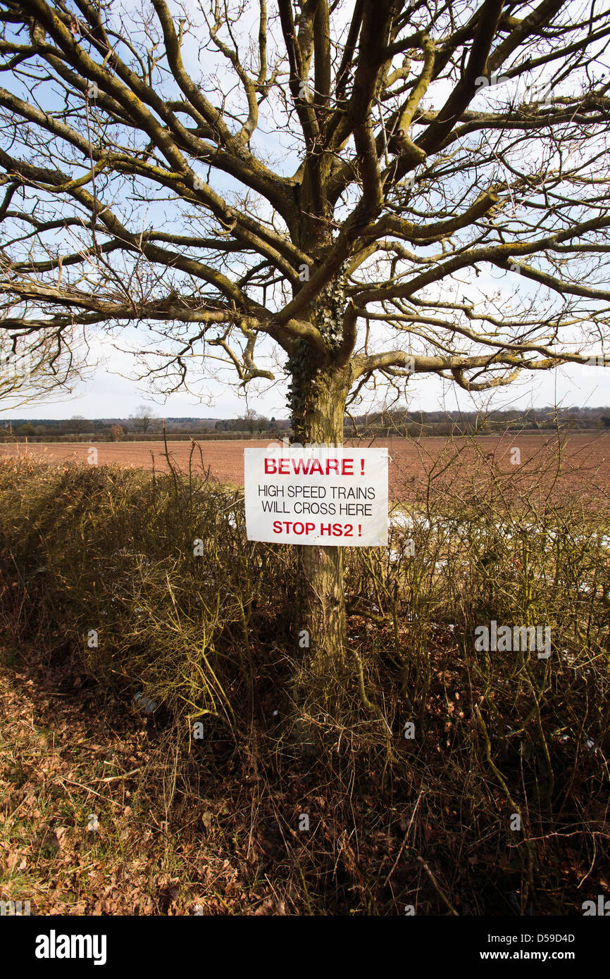 A sign protesting against the HS2 high speed railway line, which will pass through this area of Warwickshire at Cubbington Stock Photo