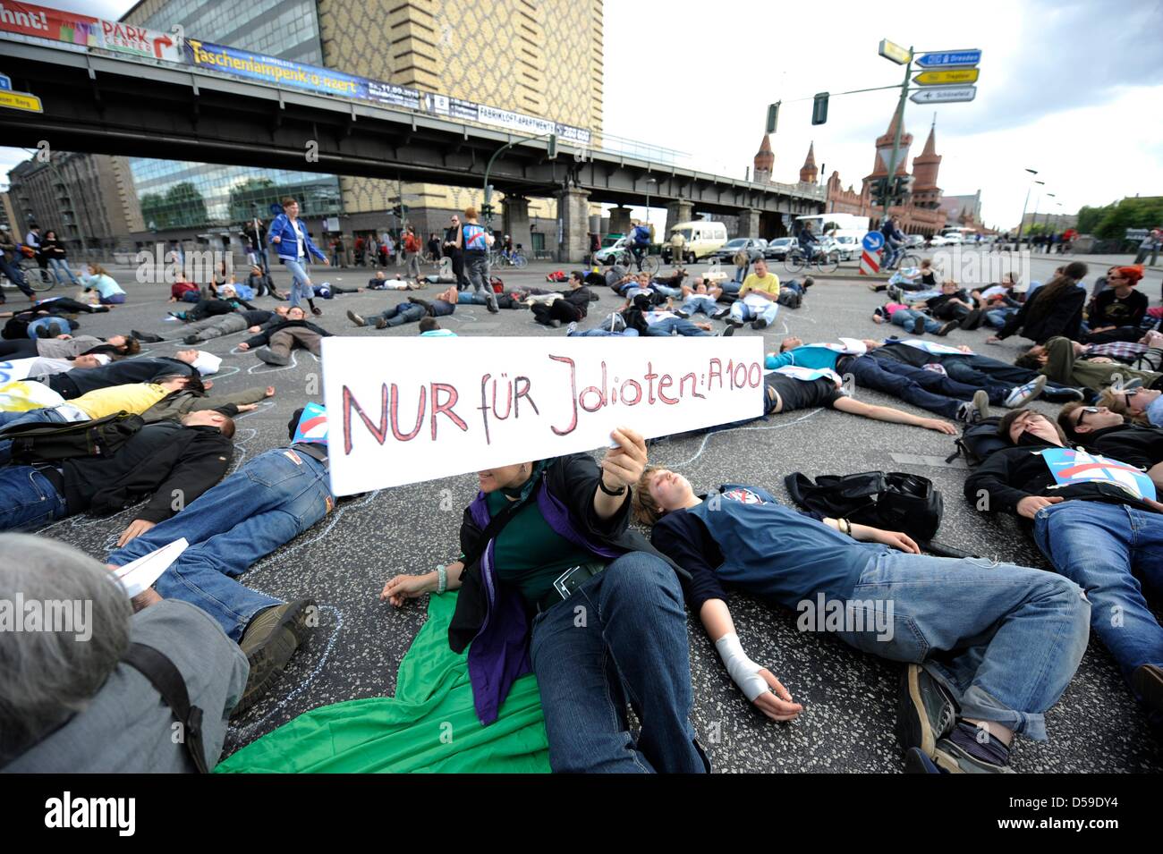 Many people block a crossroad close to the Oberbaumbridge as a ...