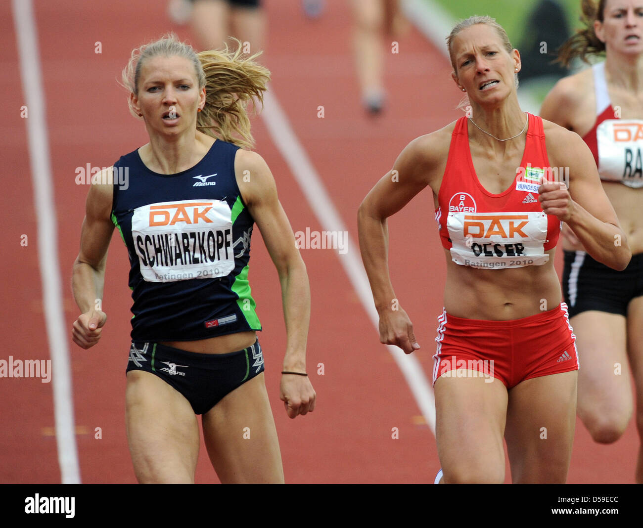 German heptathletes Lilli Schwarzkopf (L) and Jennifer Oeser at the finish of the 800m at the Erdgas Meeting, the fourth leg of the 2010 IAAF Combined Events Challenge in Ratingen, Germany, 20 June 2010. Jennifer Oeser takes the win. Photo: Jörg Carstensen Stock Photo