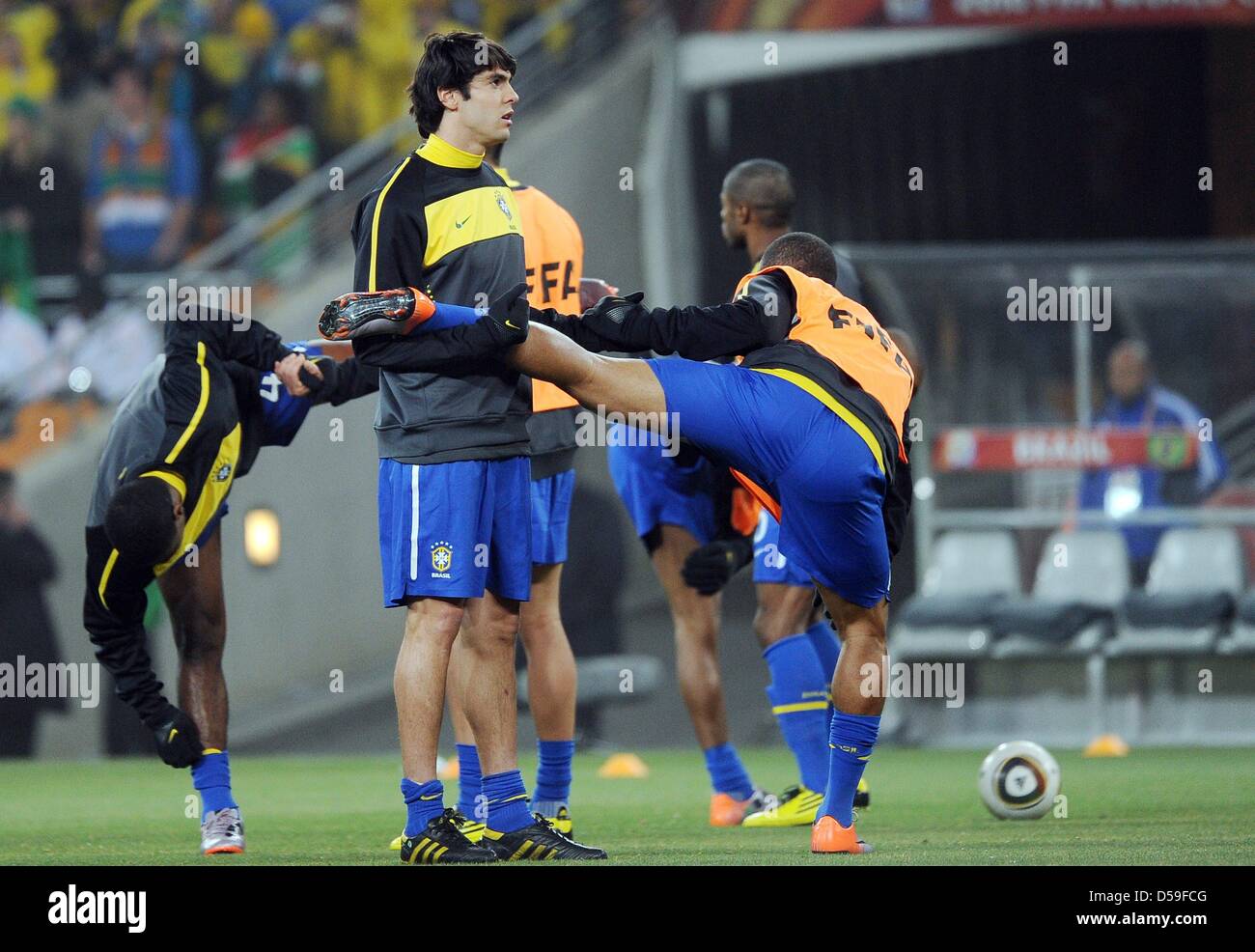 Brazil's Kaka during warm up with team mate Robinho prior to the 2010 FIFA World Cup group G match between Brazil and Ivory Coast at Soccer City Stadium in Johannesburg, South Africa 20 June 2010. Photo: Achim Scheidemann dpa - Please refer to http://dpaq.de/FIFA-WM2010-TC Stock Photo