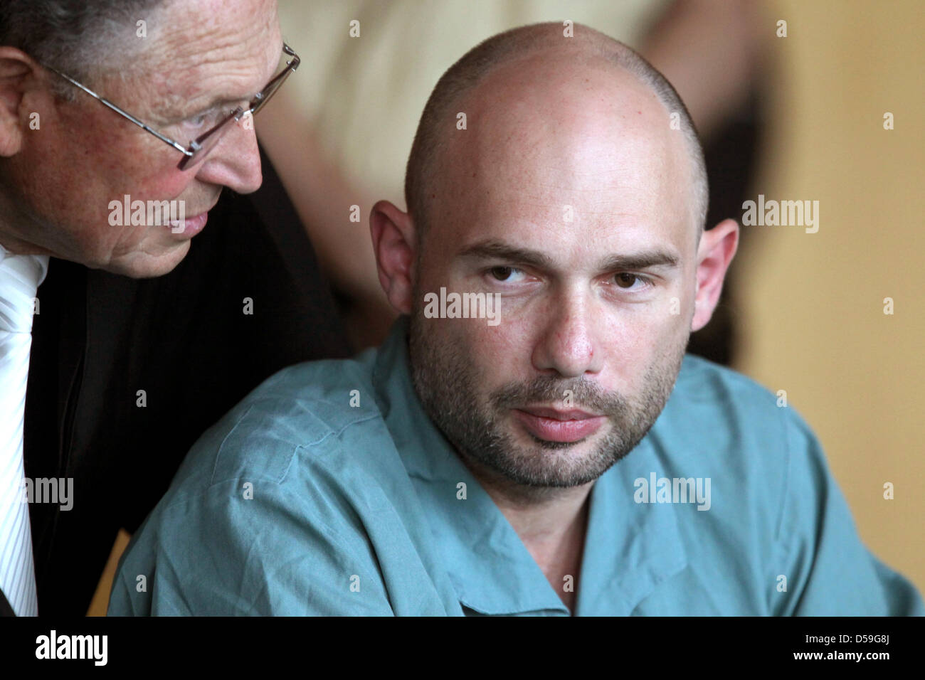 Alexander R.- accused of murder- sits in a courtroom of the regional ...