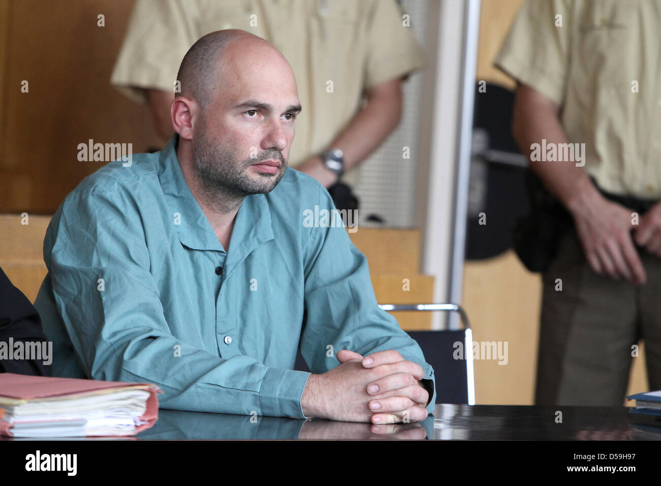 Defendant Alexander R. is in the dock at district court Aschaffenburg ...