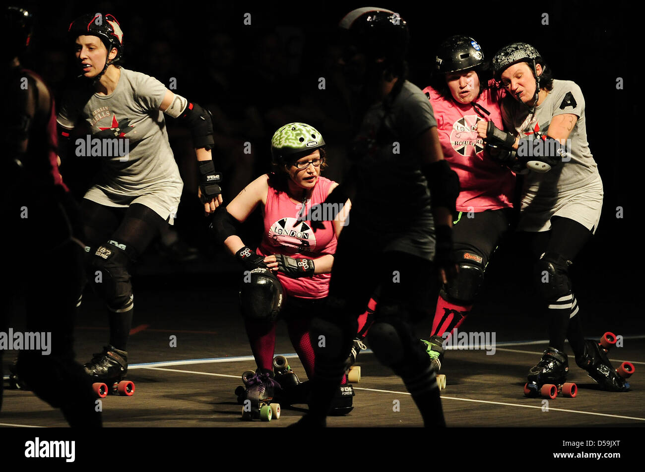 Female roller derby players of the 'Berlin Bombshells' (grey) and the