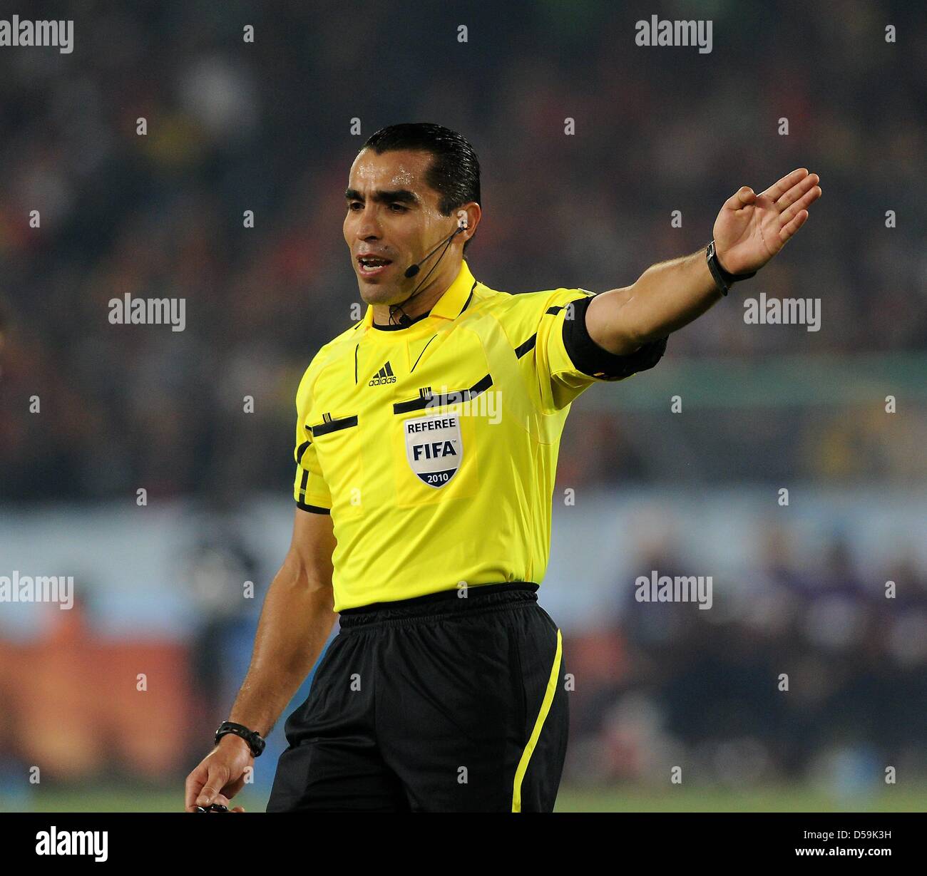 Mexican referee Marco Rodriguez gestures during the 2010 FIFA World Cup group H match between Chile and Spain at Loftus Versfeld Stadium in Pretoria, South Africa 25 June 2010. Photo: Marcus Brandt dpa - Please refer to http://dpaq.de/FIFA-WM2010-TC Stock Photo