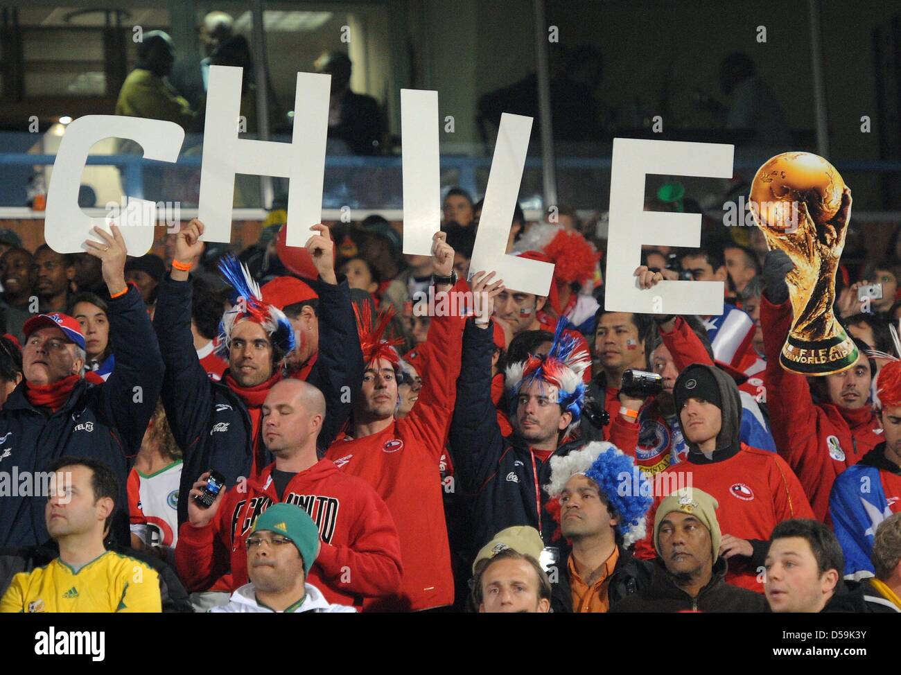 Chile fans celebrate on the stand during the 2010 FIFA World Cup group H match between Chile and Spain at Loftus Versfeld Stadium in Pretoria, South Africa 25 June 2010. Photo: Marcus Brandt dpa - Please refer to http://dpaq.de/FIFA-WM2010-TC Stock Photo