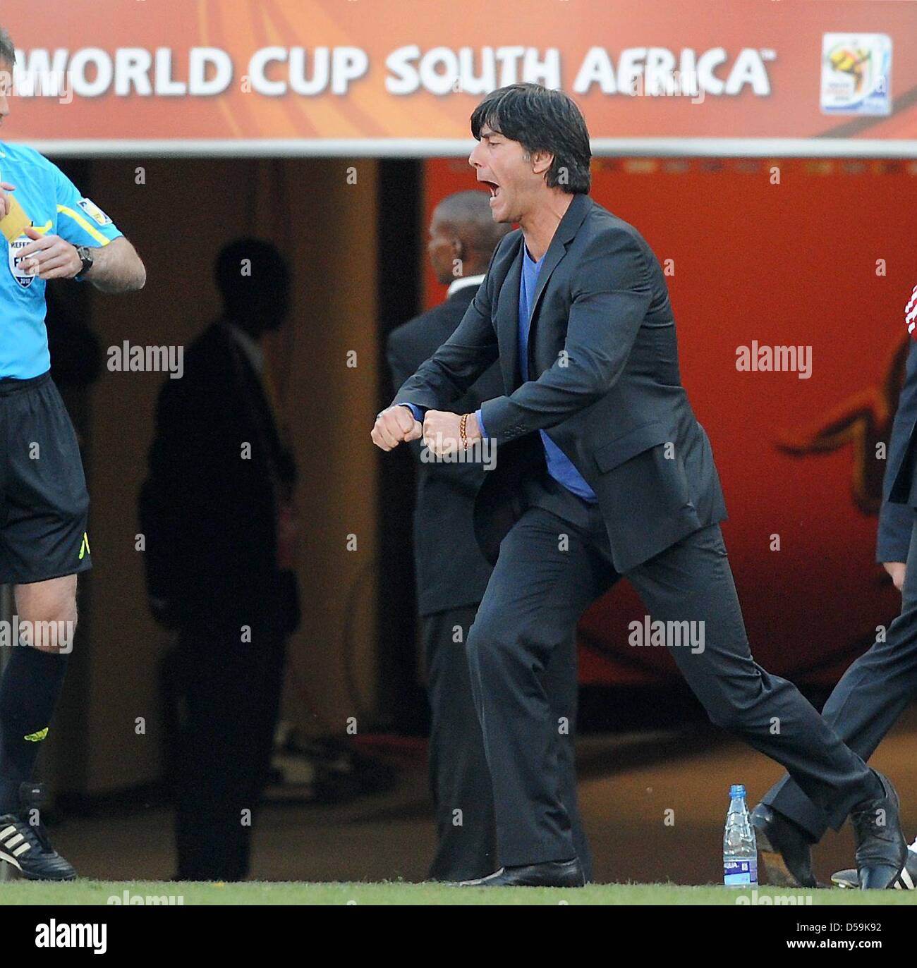 Germany's coach Joachim Loew celebrates during the 2010 FIFA World Cup Round of Sixteen match between Germany and England at the Free State Stadium in Bloemfontein, South Africa 27 June 2010. Photo: Marcus Brandt dpa - Please refer to http://dpaq.de/FIFA-WM2010-TC  +++(c) dpa - Bildfunk+++ Stock Photo