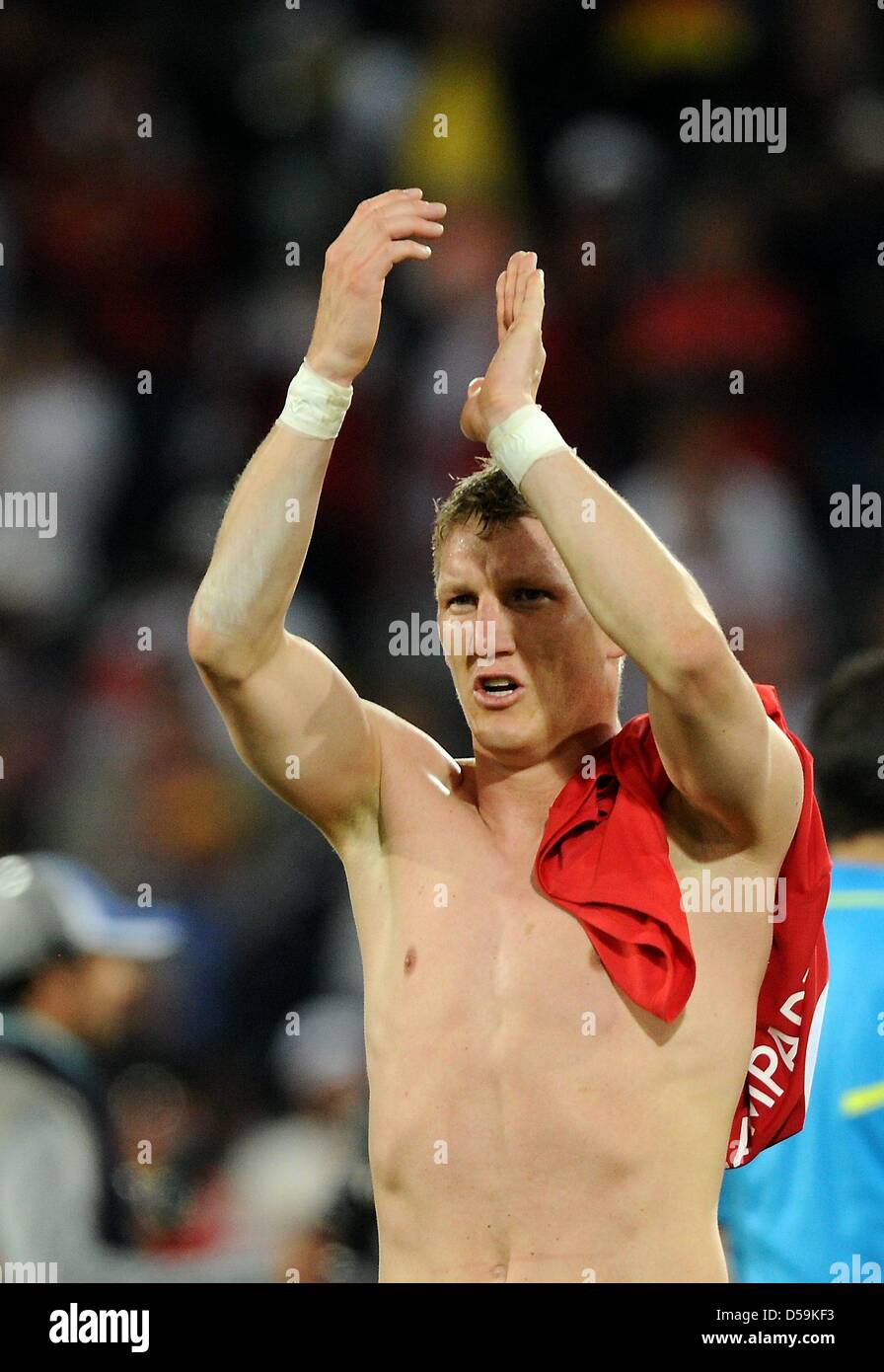 Germany's Bastian Schweinsteiger celebrates after the 2010 FIFA World Cup Round of Sixteen match between Germany and England at the Free State Stadium in Bloemfontein, South Africa 27 June 2010. Photo: Marcus Brandt dpa - Please refer to http://dpaq.de/FIFA-WM2010-TC  +++(c) dpa - Bildfunk+++ Stock Photo