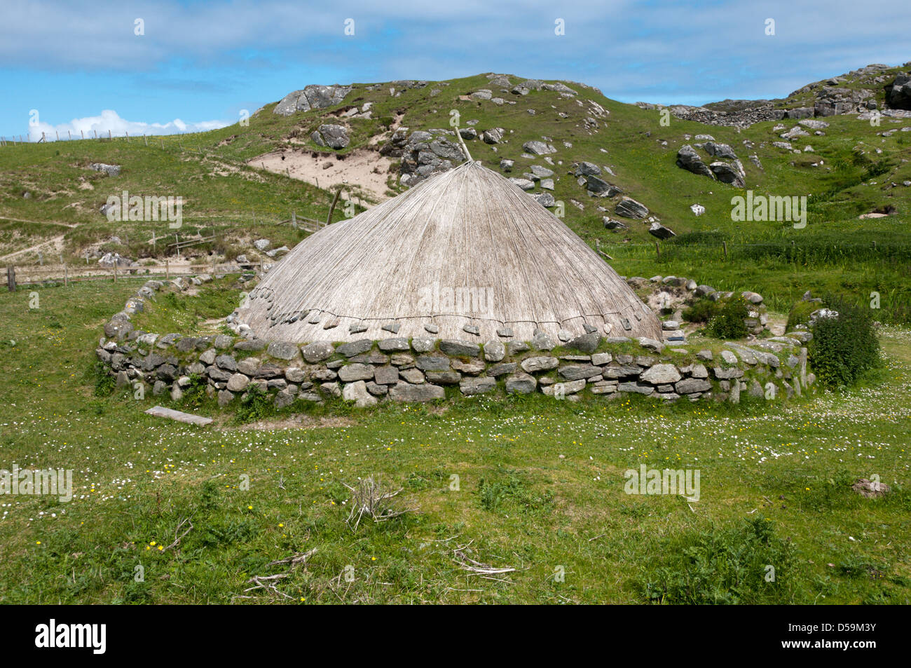 Re-constructed iron-age house at Bostadh on the Isle of Lewis in the Outer Hebrides. Stock Photo