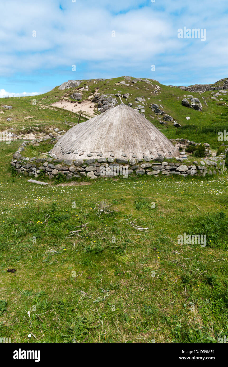 Re-constructed iron-age house at Bostadh on the Isle of Lewis in the Outer Hebrides Stock Photo