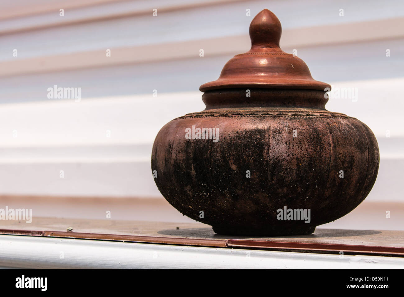 Clay pot on drinking water is the Thai way of life Stock Photo