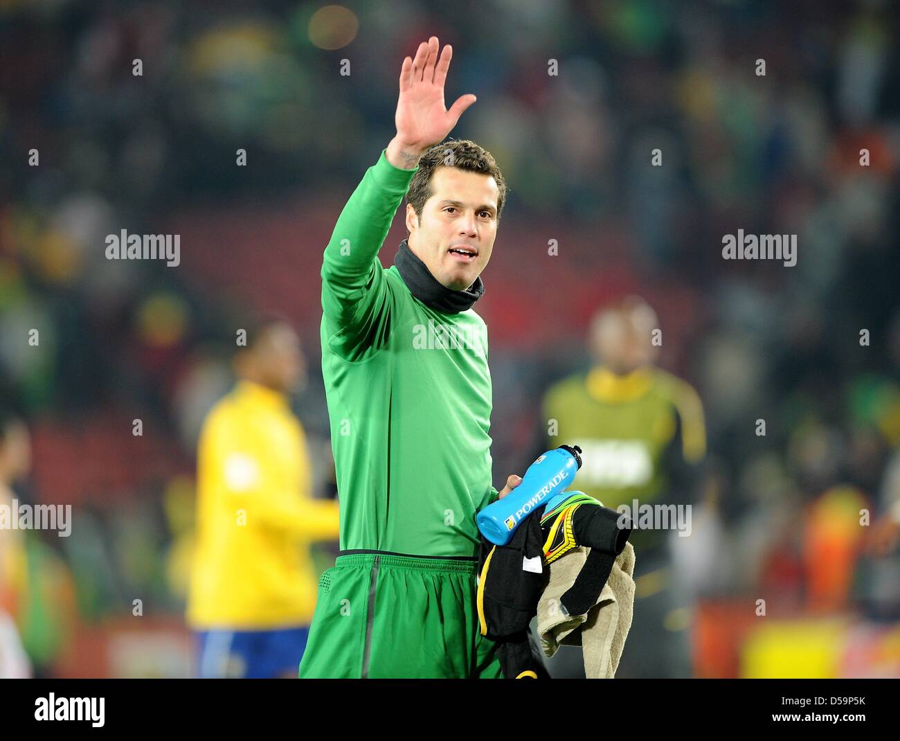 Brazil's goalkeeper Julio Cesar waves after the 2010 FIFA World Cup Round of Sixteen match between Brazil and Chile at the Ellis Park Stadium in Johannesburg, South Africa 28 June 2010. Photo: Marcus Brandt dpa - Please refer to http://dpaq.de/FIFA-WM2010-TC  +++(c) dpa - Bildfunk+++ Stock Photo