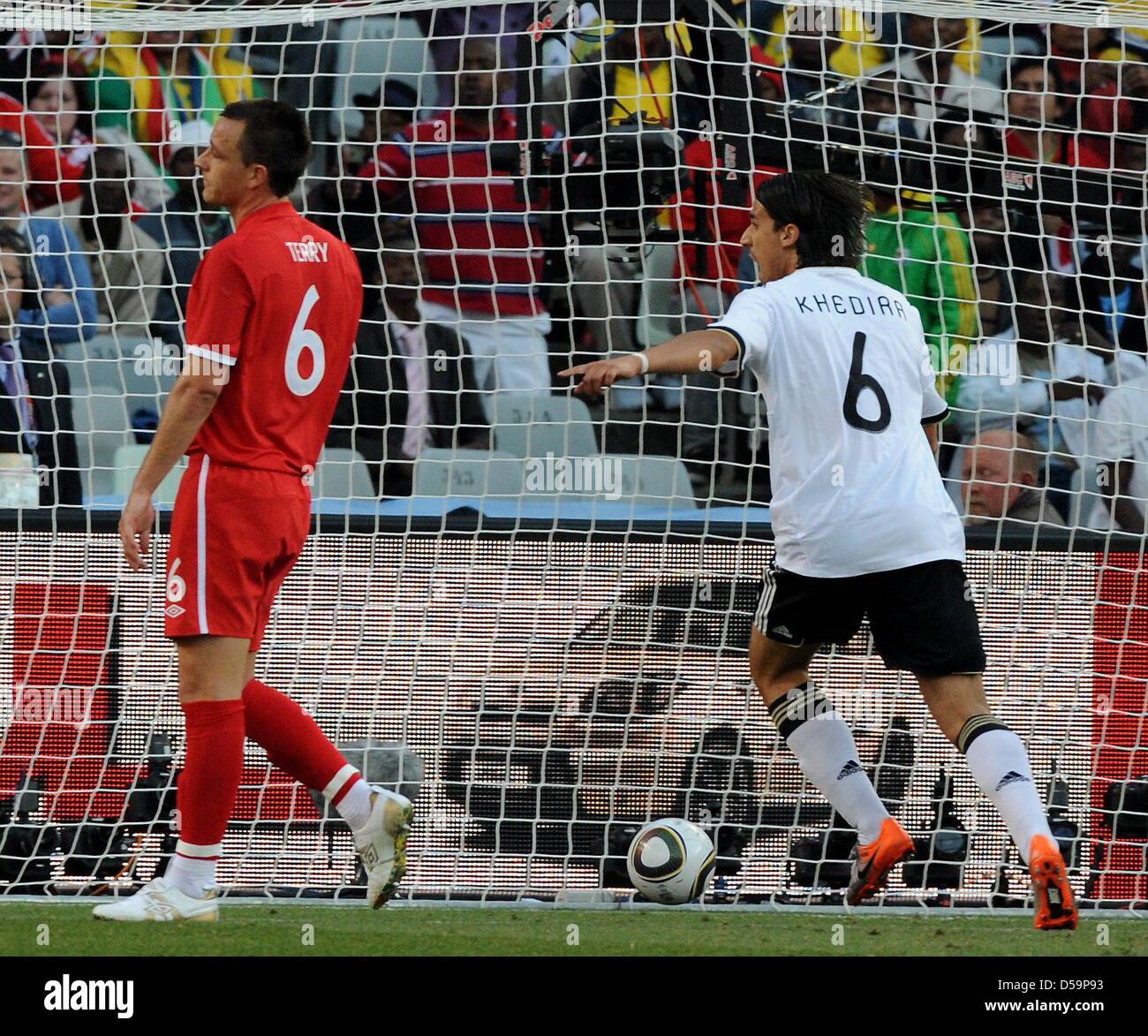 Germany's Sami Khedira celebrates next to England's John Terry during the 2010 FIFA World Cup Round of Sixteen match between Germany and England at the Free State Stadium in Bloemfontein, South Africa 27 June 2010. Photo: Marcus Brandt dpa - Please refer to http://dpaq.de/FIFA-WM2010-TC Stock Photo