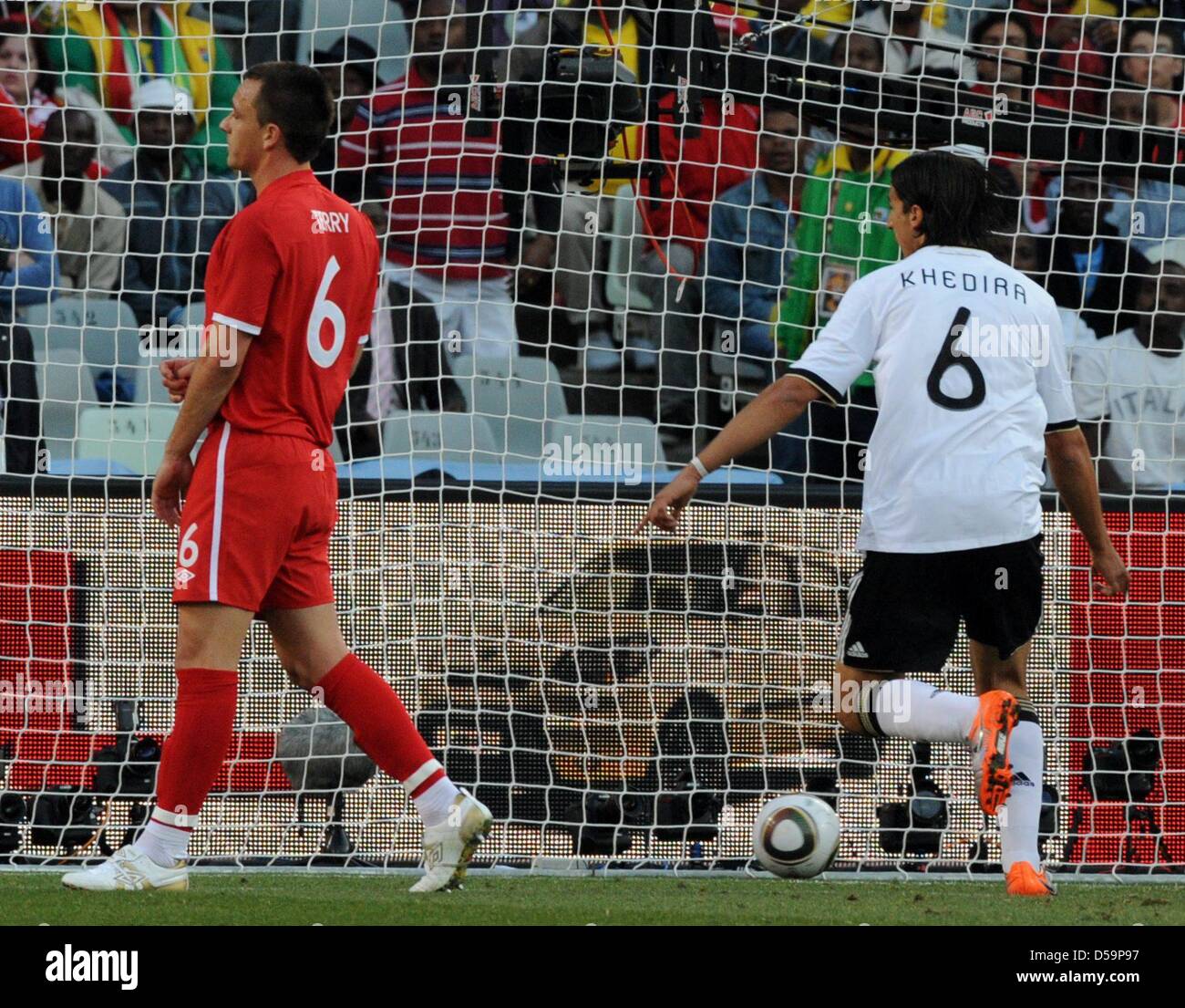 Germany's Sami Khedira celebrates next to England's John Terry during the 2010 FIFA World Cup Round of Sixteen match between Germany and England at the Free State Stadium in Bloemfontein, South Africa 27 June 2010. Photo: Marcus Brandt dpa - Please refer to http://dpaq.de/FIFA-WM2010-TC Stock Photo