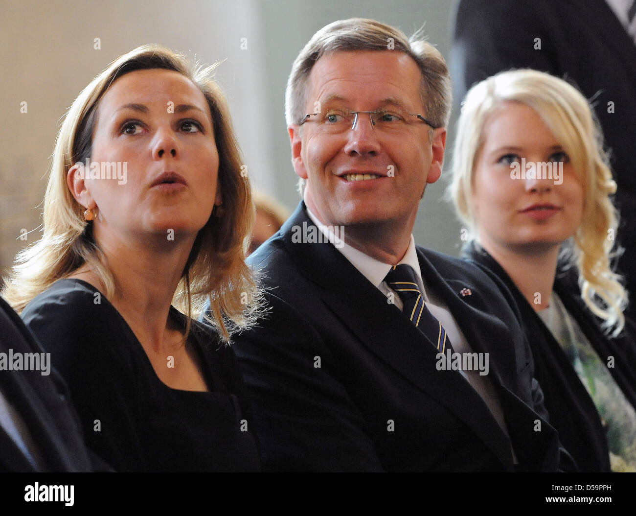 Presidential candidate Christian Wulff (C), his wife Bettina Wulff (L), and his daughter from first marriage Annalena (R) arrive for an ecumenical church service at St Hedwig cathedral in Berlin, Germany, 30 June 2010. The Federal Convention will elect the next German President later the day. Photo: Tobias Kleinschmidt Stock Photo