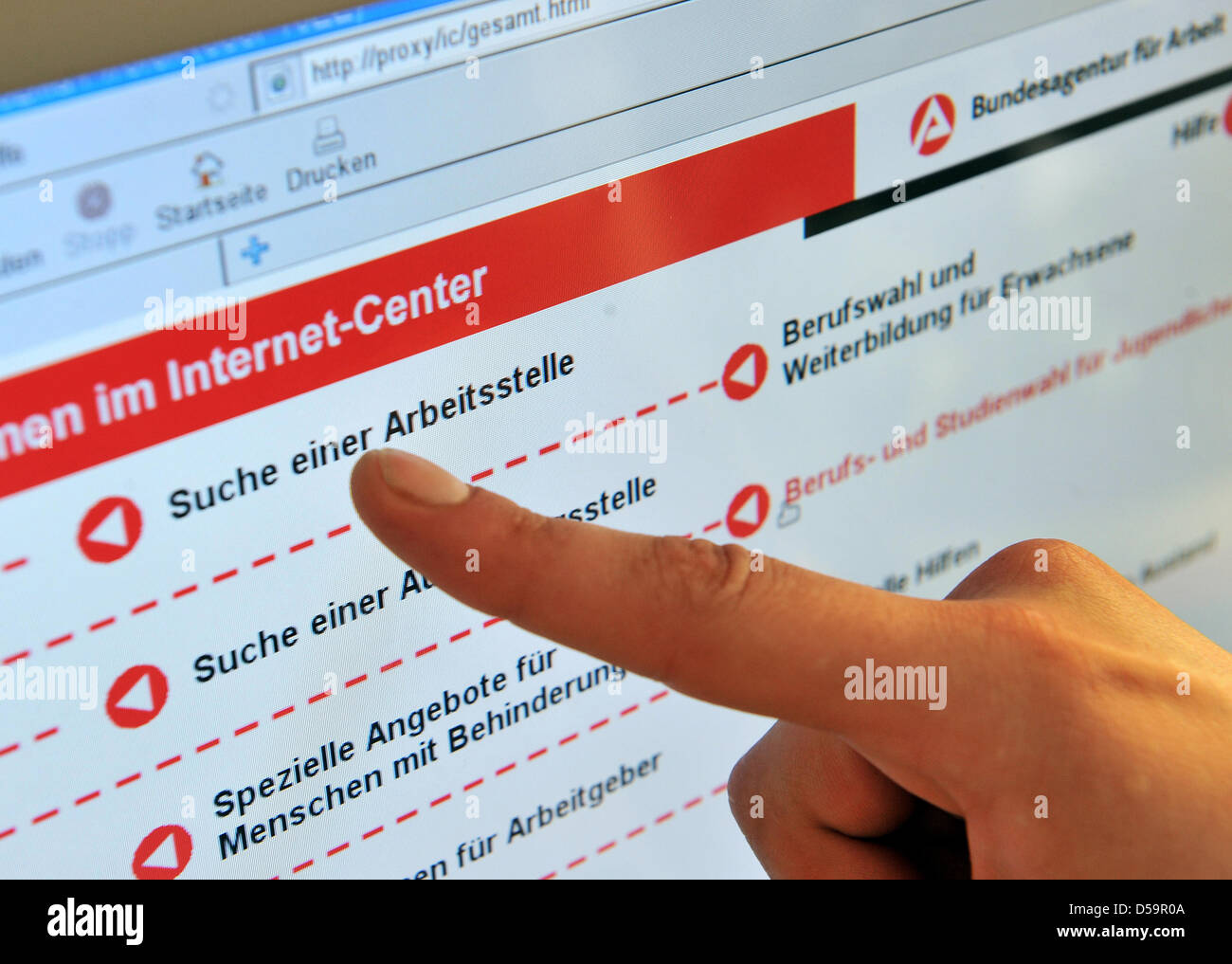 Customers of the local job centre queue in Leipzig, Germany, 30 June 2010. Unemployment rate has