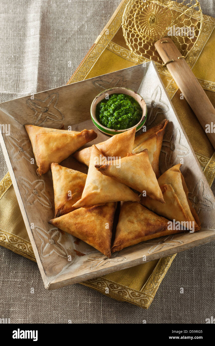 Samosas and mint chutney Indian snack food Stock Photo