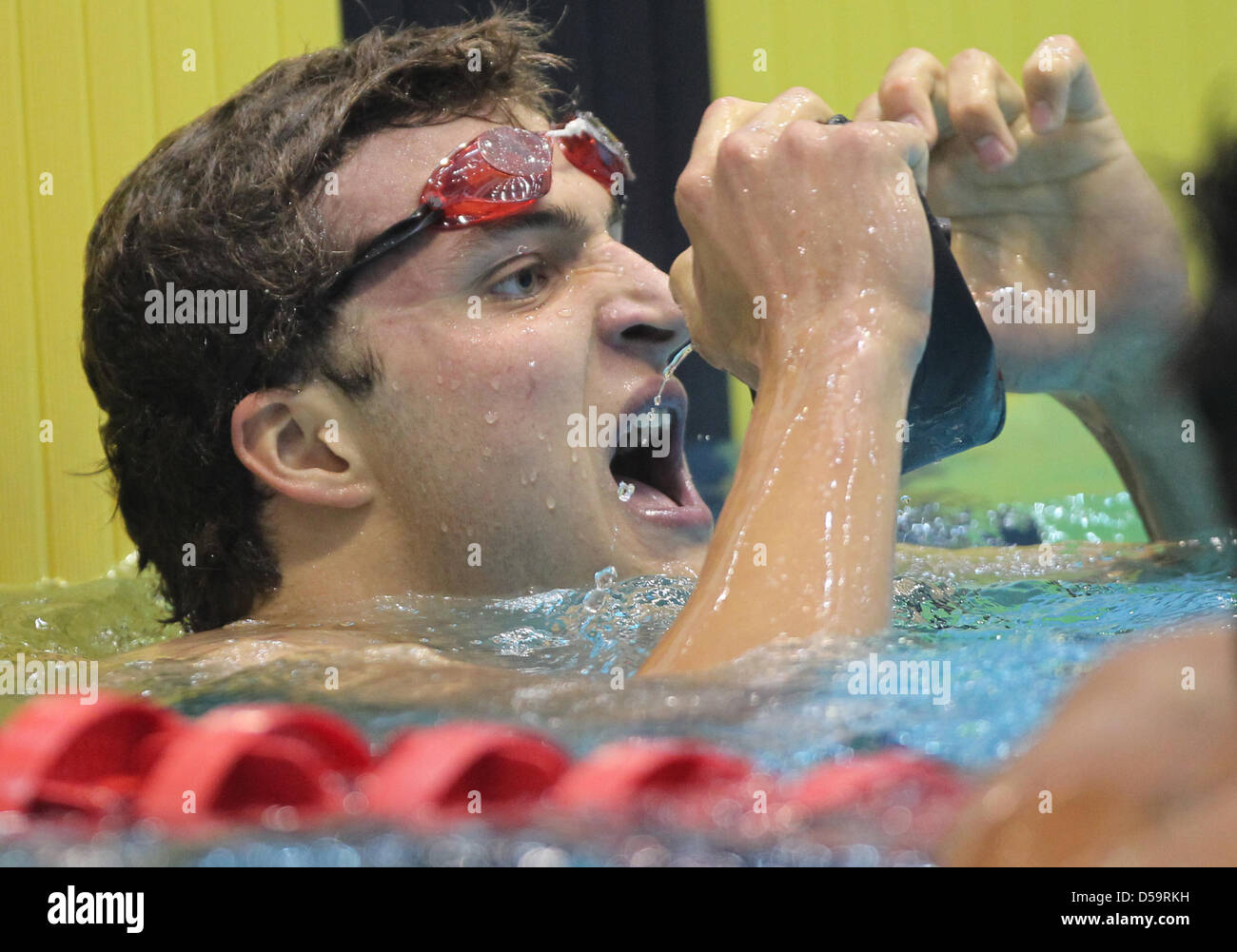 Markus Deibler celebrates winning the 200m Medley at the 122th German Swimming Championships in Berlin, Germany, 01 July 2010. Photo: Jens Wolf Stock Photo
