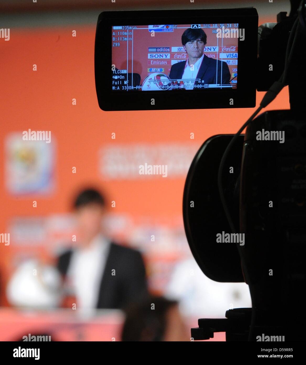German headcoach Joachim Loew seen on a camera screen during a press conference of the German team at the Green Point Stadium in Cape Town, South Africa 02 July 2010. Photo: Marcus Brandt dpa - Please refer to http://dpaq.de/FIFA-WM2010-TC  +++(c) dpa - Bildfunk+++ Stock Photo