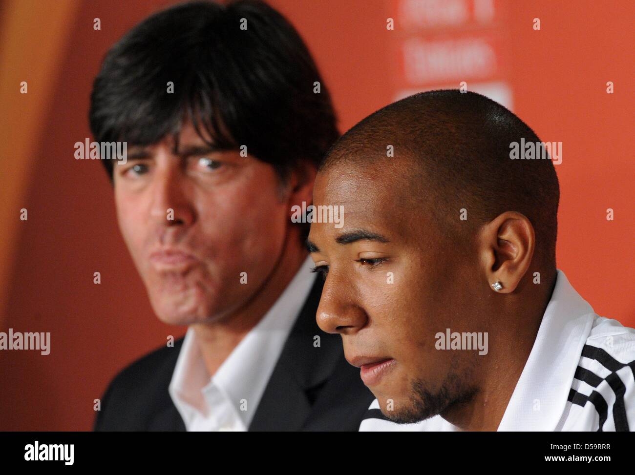 German headcoach Joachim Loew (L) and player Jerome Boateng during a press conference of the German team at the Green Point Stadium in Cape Town, South Africa 02 July 2010. Photo: Marcus Brandt dpa - Please refer to http://dpaq.de/FIFA-WM2010-TC  +++(c) dpa - Bildfunk+++ Stock Photo
