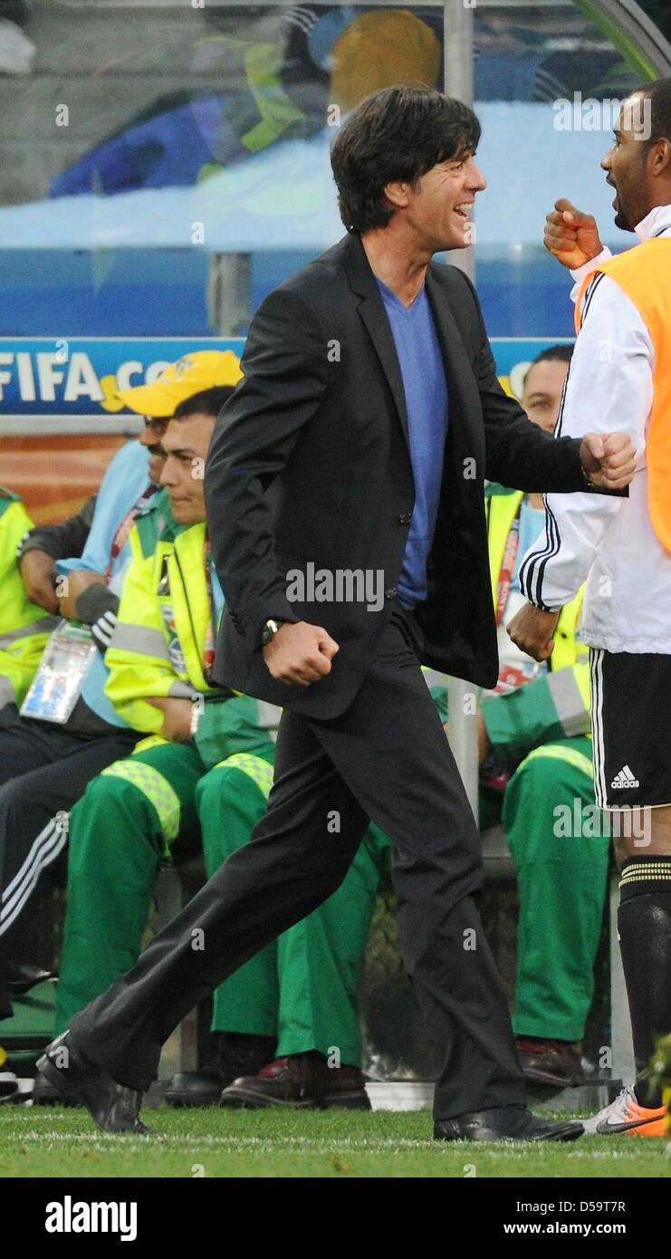 Germany's coach Joachim Loew celebrates during the 2010 FIFA World Cup quarterfinal match between Argentina and Germany at the Green Point Stadium in Cape Town, South Africa 03 July 2010. Photo: Marcus Brandt dpa - Please refer to http://dpaq.de/FIFA-WM2010-TC  +++(c) dpa - Bildfunk+++ Stock Photo