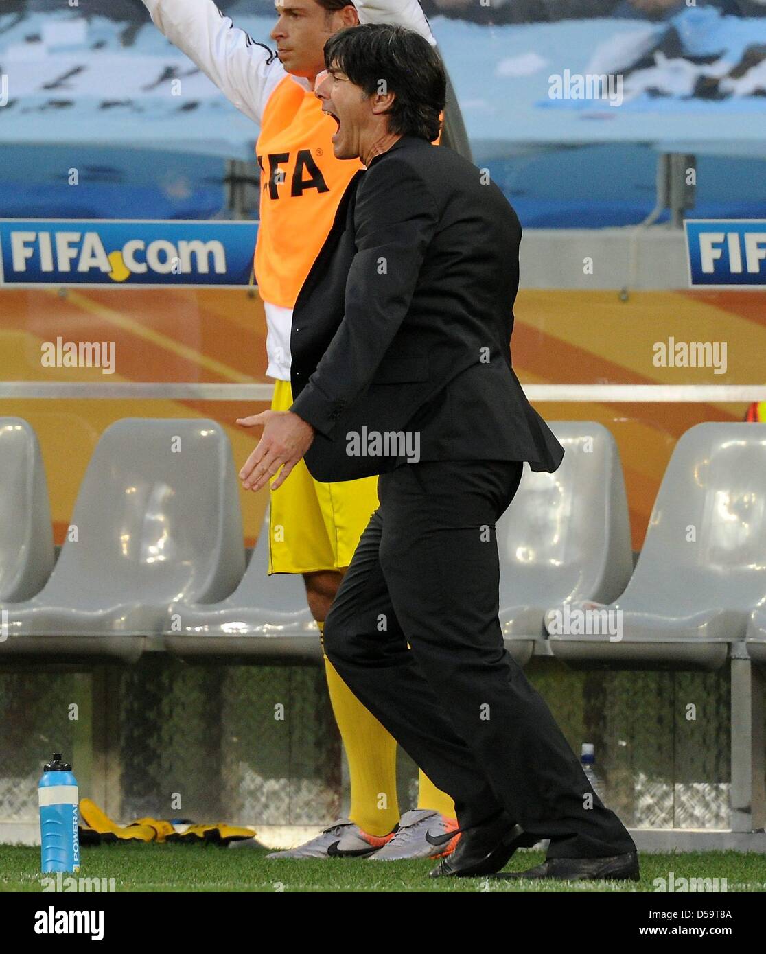 Germany's coach Joachim Loew celebrates during the 2010 FIFA World Cup quarterfinal match between Argentina and Germany at the Green Point Stadium in Cape Town, South Africa 03 July 2010. Photo: Marcus Brandt dpa - Please refer to http://dpaq.de/FIFA-WM2010-TC  +++(c) dpa - Bildfunk+++ Stock Photo