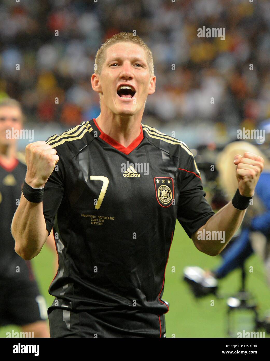 Germany's Bastian Schweinsteiger celebrates after the 2010 FIFA World Cup quarterfinal match between Argentina and Germany at the Green Point Stadium in Cape Town, South Africa 03 July 2010. Photo: Marcus Brandt dpa - Please refer to http://dpaq.de/FIFA-WM2010-TC  +++(c) dpa - Bildfunk+++ Stock Photo