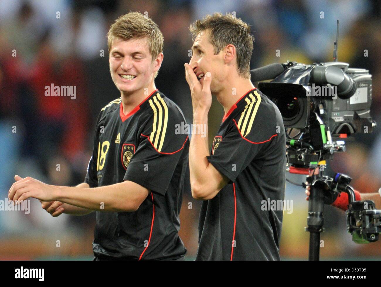 Toni Kroos (L) and Miroslav Klose of Germany celebrate after the final whistle of the FIFA World Cup 2010 quarterfinal match between Argentina and Germany at the Green Point Stadium in Cape Town, South Africa 03 July 2010. Photo: Bernd Weissbrod dpa - Please refer to http://dpaq.de/FIFA-WM2010-TC  +++(c) dpa - Bildfunk+++ Stock Photo