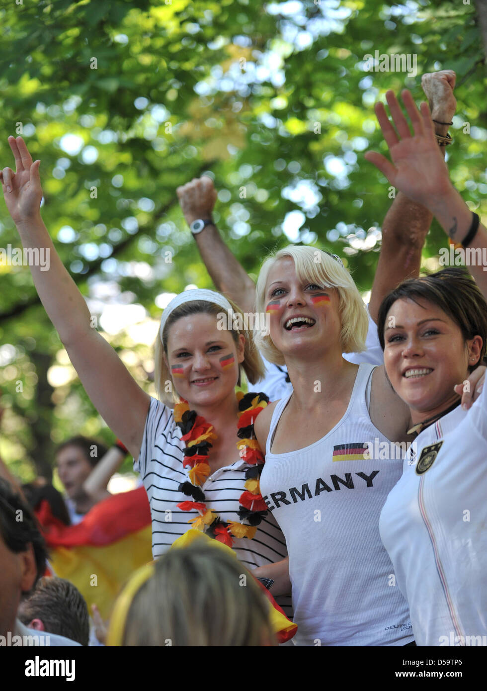 Fans of the German soccer team cheer after the World Cub quarterfinal
