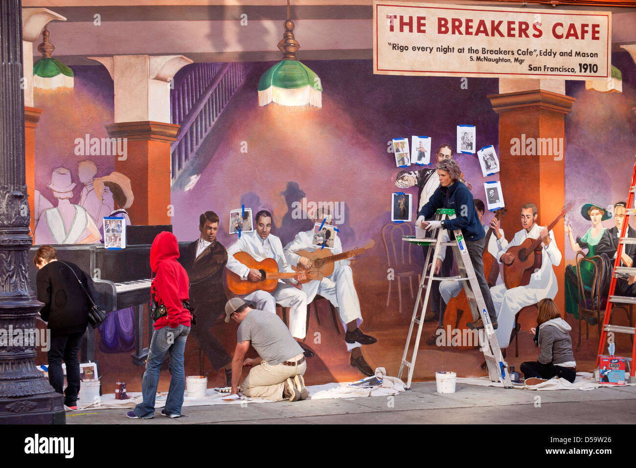 artists painting a mural for the Breakers Cafe, San Francisco, California, United States of America, USA Stock Photo