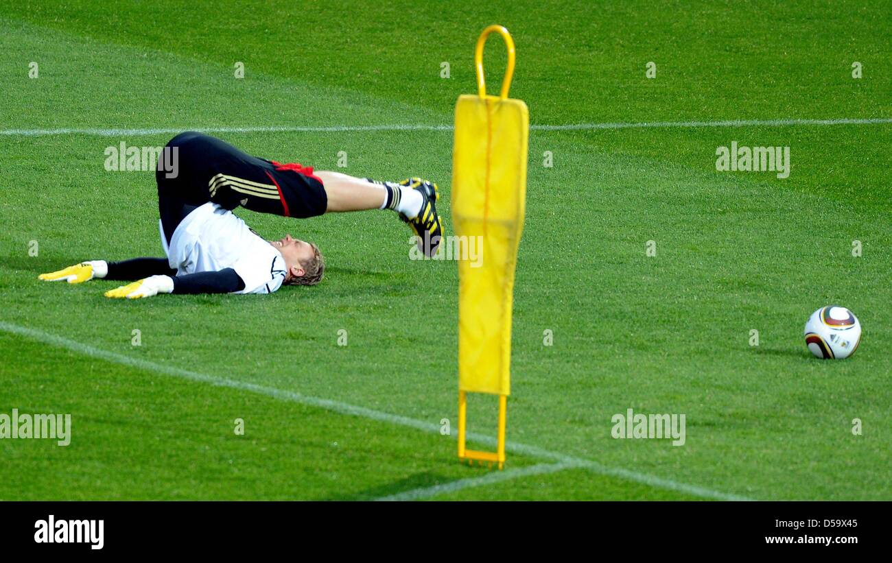 German goalkeeper Manuel Neuer stretches during a training session of ...