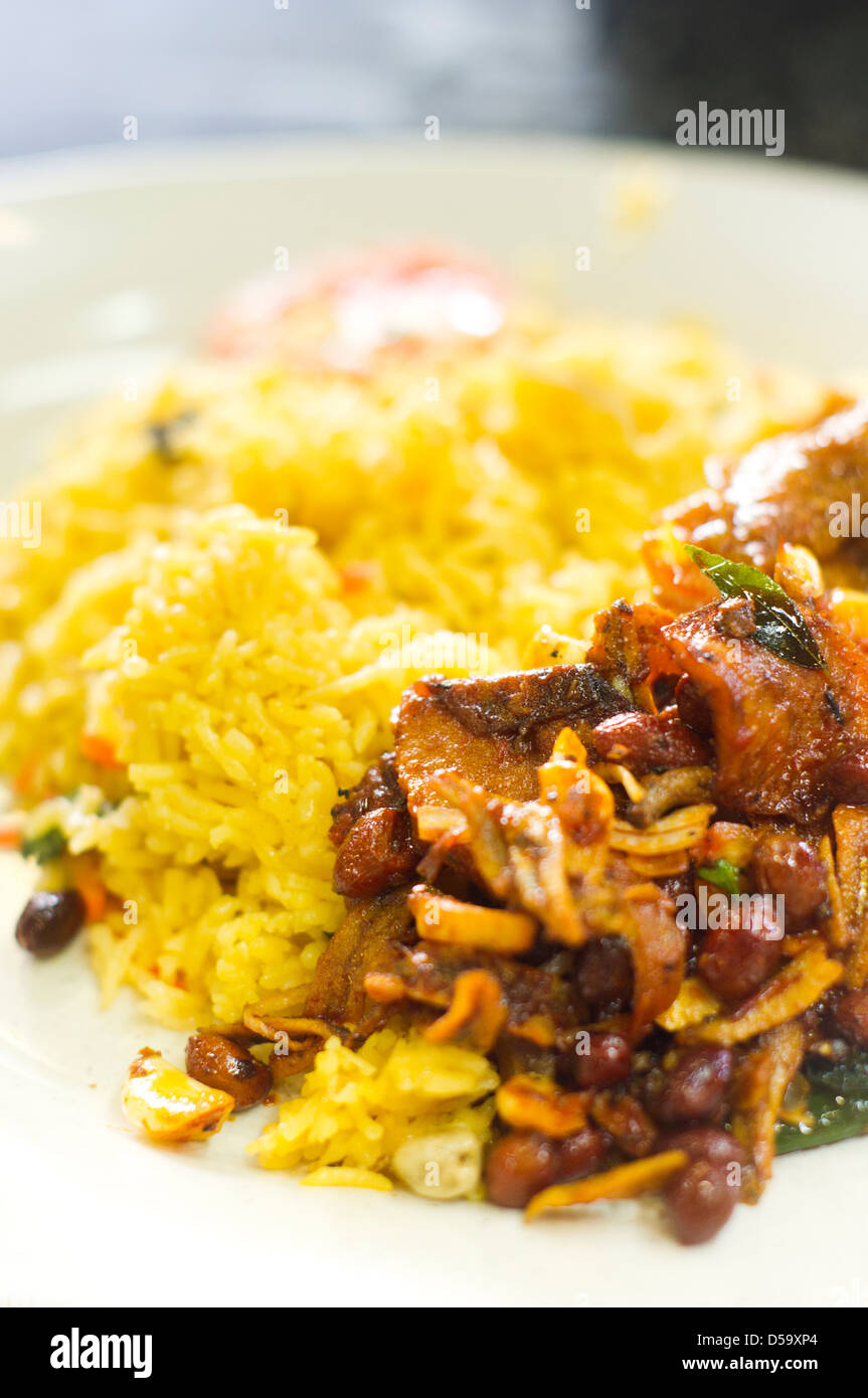 Nasi Biryani, biriani, or beriani, is a common food in malaysia and singapore. Photo is taken at Kuala Lumpur, Malaysia. Stock Photo