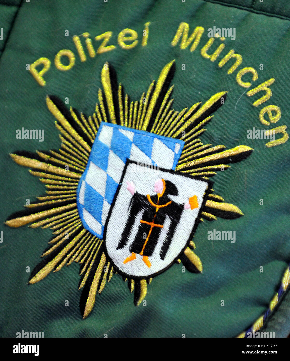View of the logo of the Munch police on a saddlecloth of the riding team of the Bavarian police in Munich, Germany, 27 March 2013. The horse riding team of the Bavarian police does regular patrol duty as well as special operations like demonstrations and soccer games. Photo: Frank Leonhardt Stock Photo