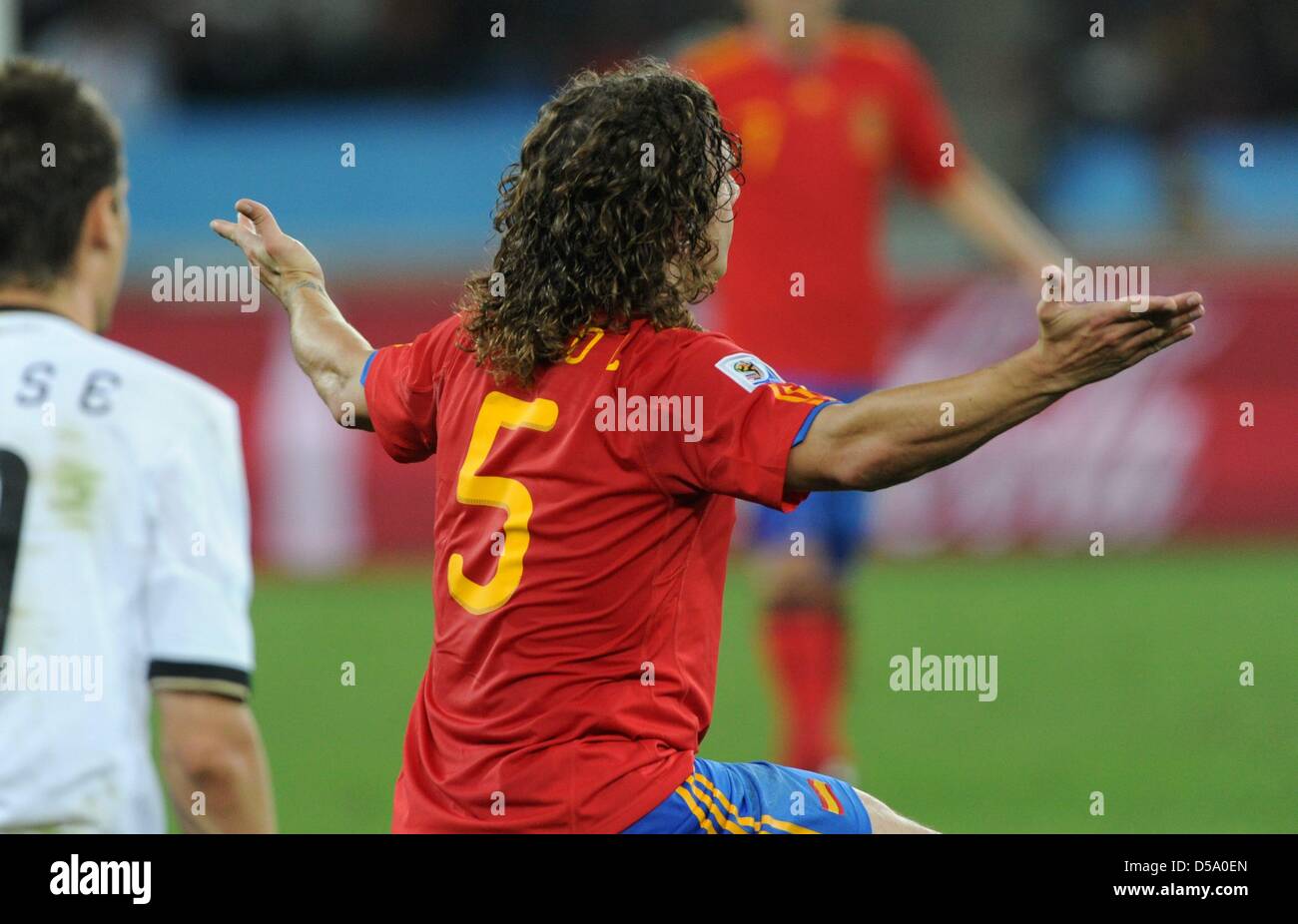 Spain's Carles Puyol gestures during the 2010 FIFA World Cup semi-final match between Germany and Spain at the Durban Stadium in Durban, South Africa 07 July 2010. Spain won 1-0. Photo: Marcus Brandt dpa - Please refer to http://dpaq.de/FIFA-WM2010-TC Stock Photo
