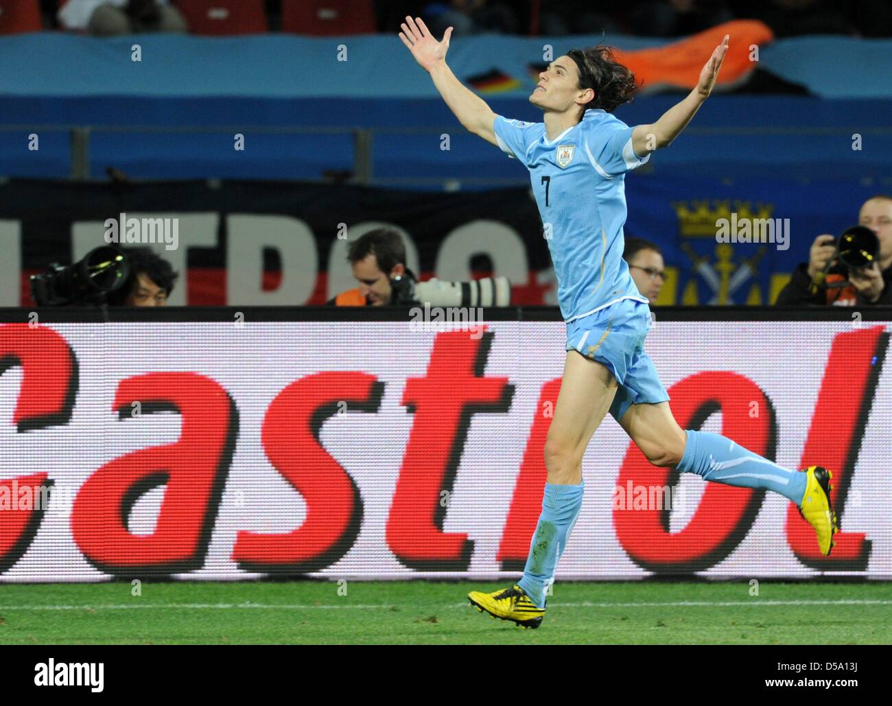 Uruguay's Edinson Cavani celebrates after equalising 1-1 during the 2010 FIFA World Cup third place match between Uruguay and Germany at the Nelson Mandela Bay Stadium in Port Elizabeth, South Africa 10 July 2010. Photo: Marcus Brandt dpa - Please refer to http://dpaq.de/FIFA-WM2010-TC  +++(c) dpa - Bildfunk+++ Stock Photo