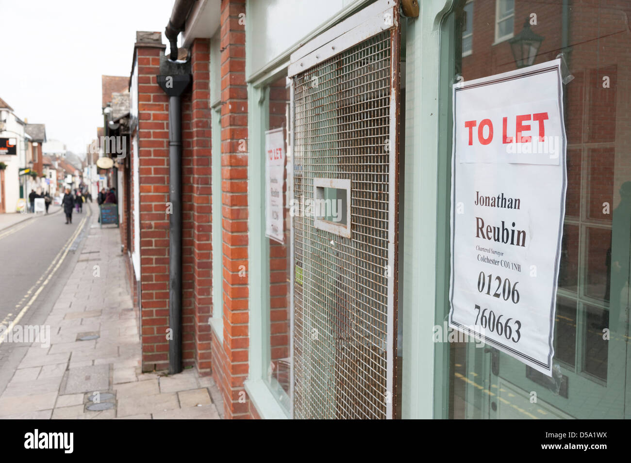 Boarded up shops to let in a High Street in Colchester UK Stock Photo Alamy