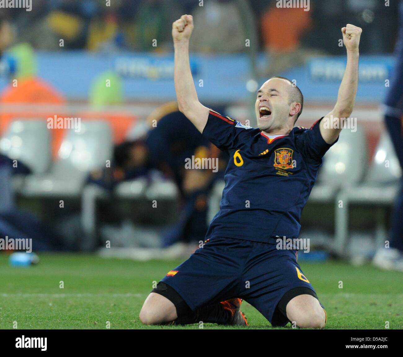 Spain's Andres Iniesta celebrates scoring the 1-0 winning goal during the 2010 FIFA World Cup final match between the Netherlands and Spain at Soccer City Stadium in Johannesburg, South Africa 11 July 2010. Photo: Marcus Brandt dpa - Please refer to http://dpaq.de/FIFA-WM2010-TC  +++(c) dpa - Bildfunk+++ Stock Photo