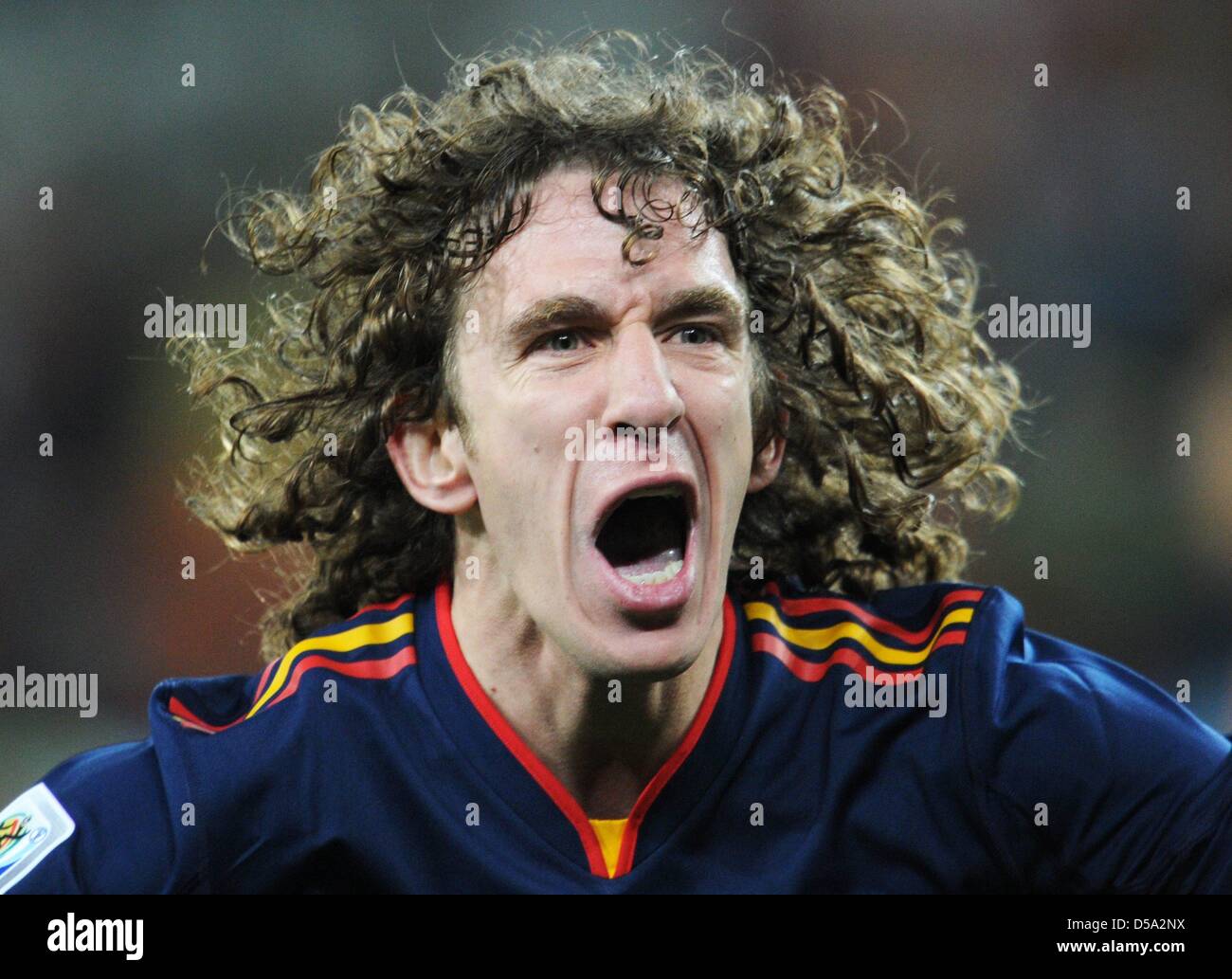 Carles Puyol of Spain celebrates after the final whistle of the 2010 FIFA World Cup final match between the Netherlands and Spain at the Soccer City Stadium in Johannesburg, South Africa 11 July 2010. Photo: Bernd Weissbrod dpa - Please refer to http://dpaq.de/FIFA-WM2010-TC  +++(c) dpa - Bildfunk+++ Stock Photo