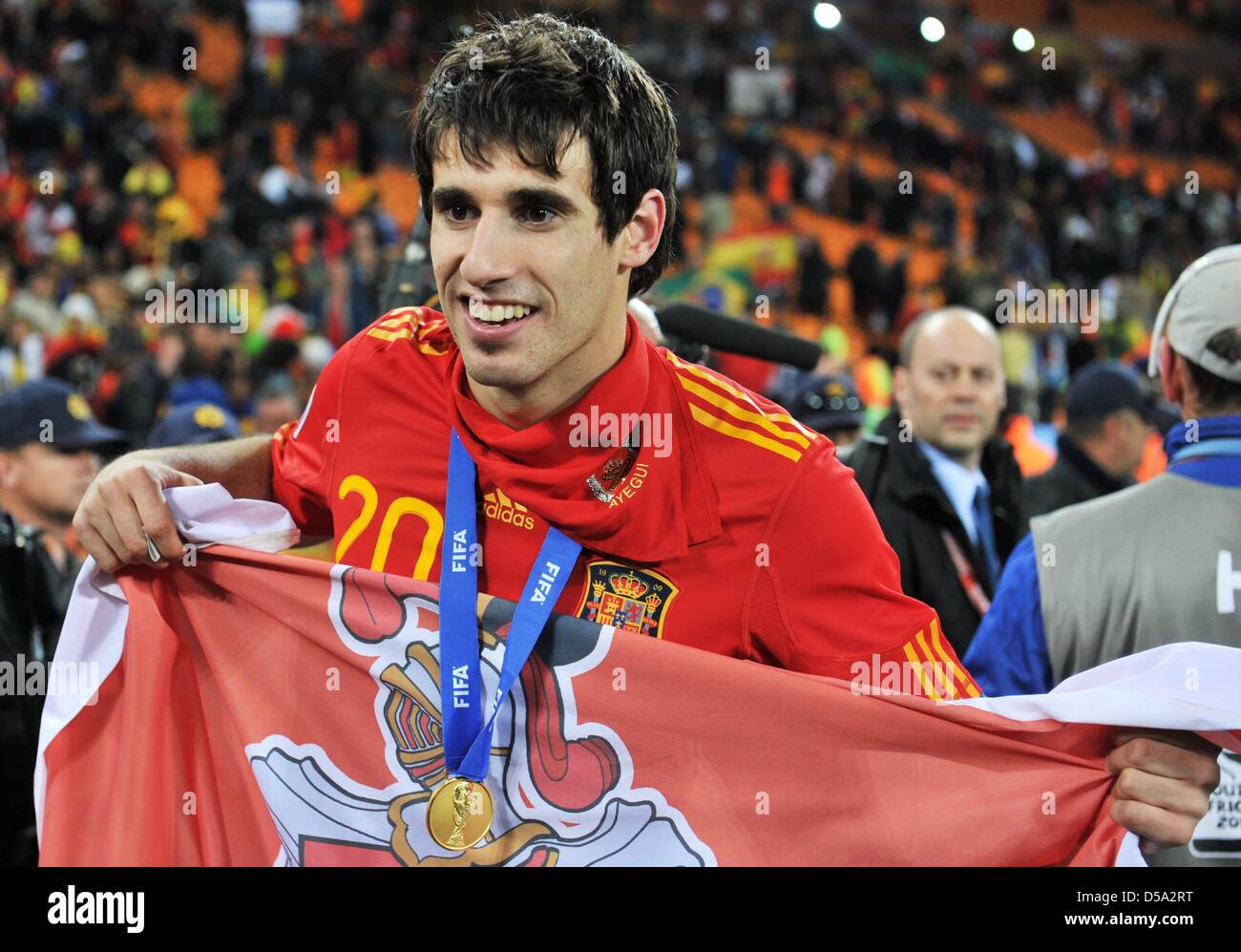 Javier Martinez of Spain celebrates after the final whistle of the 2010 FIFA World Cup final match between the Netherlands and Spain at the Soccer City Stadium in Johannesburg, South Africa 11 July 2010. Photo: Bernd Weissbrod dpa - Please refer to http://dpaq.de/FIFA-WM2010-TC Stock Photo