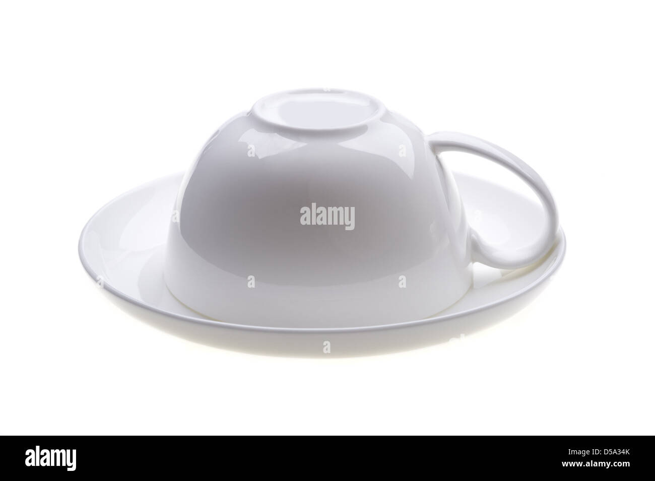 Cup upside down on a saucer Stock Photo Alamy