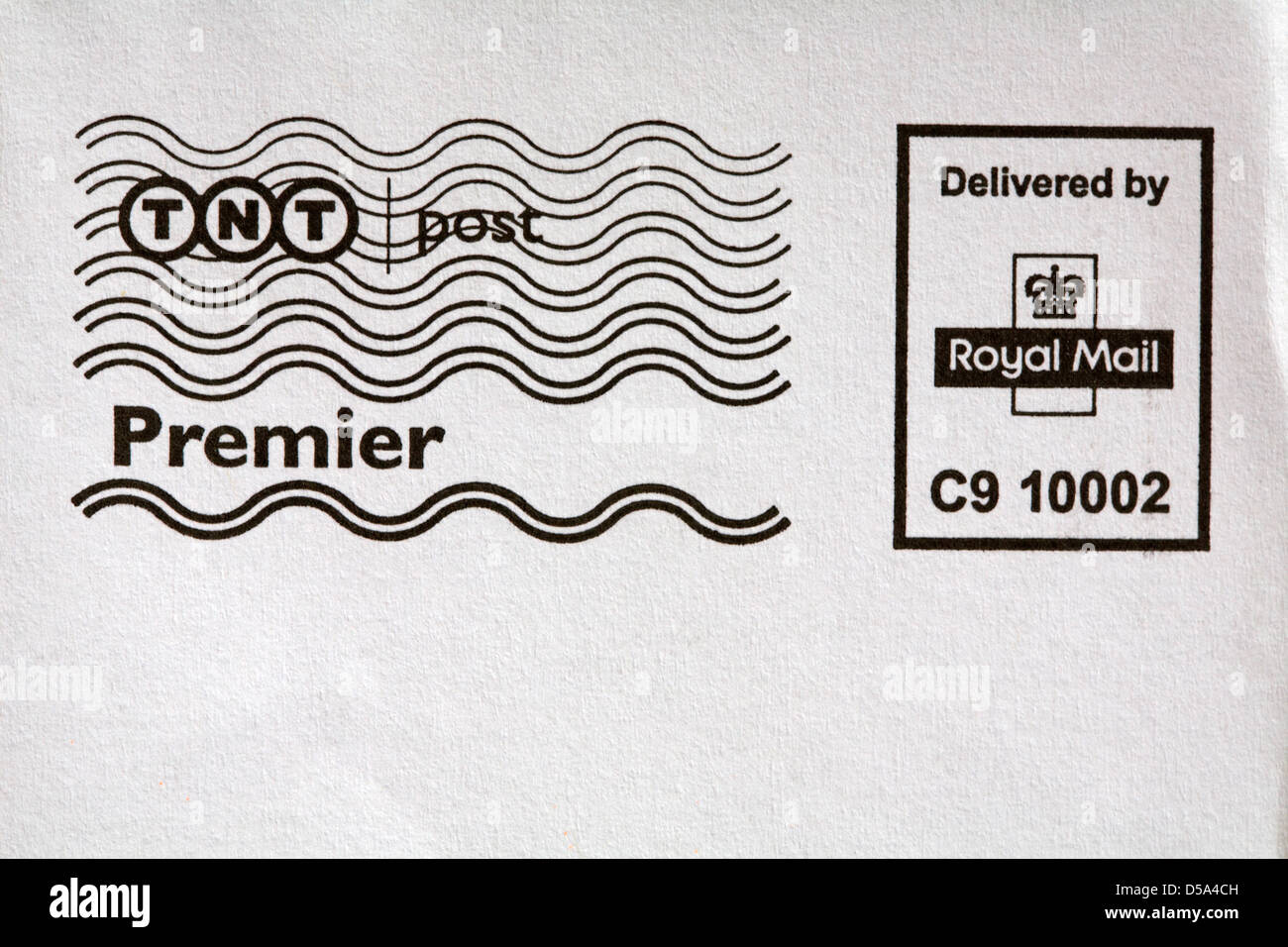 TNT Post Premier delivered by Royal Mail information on envelope Stock Photo