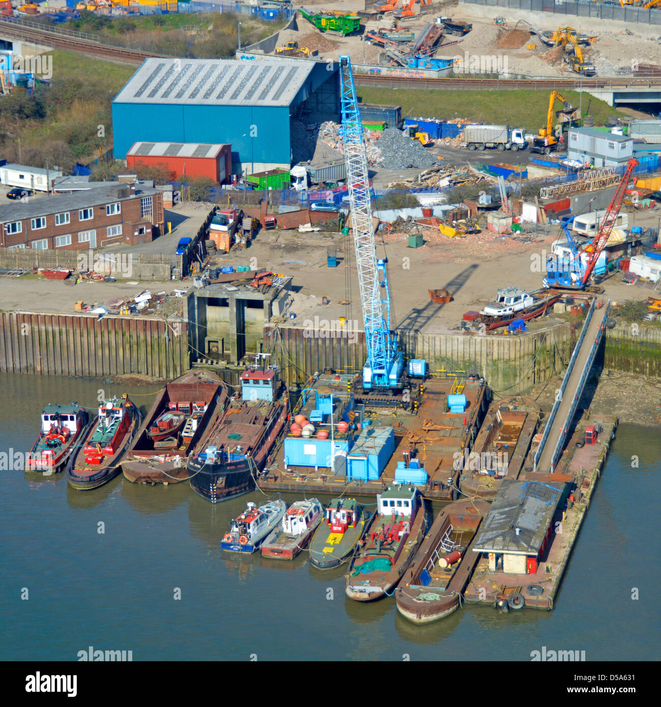Aerial view of boat and barge repair yard beside the River Thames Stock Photo