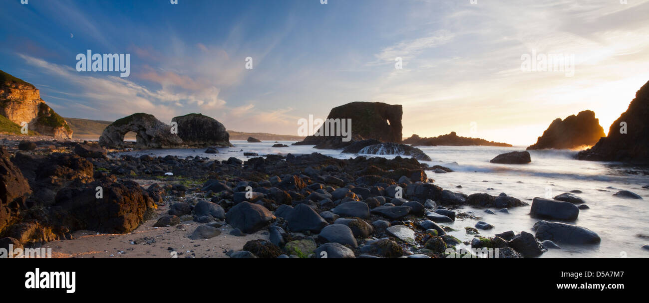 Sunset panorama of Whitepark Bay, Causeway Coast; County Antrim, Northern Ireland. Stock Photo
