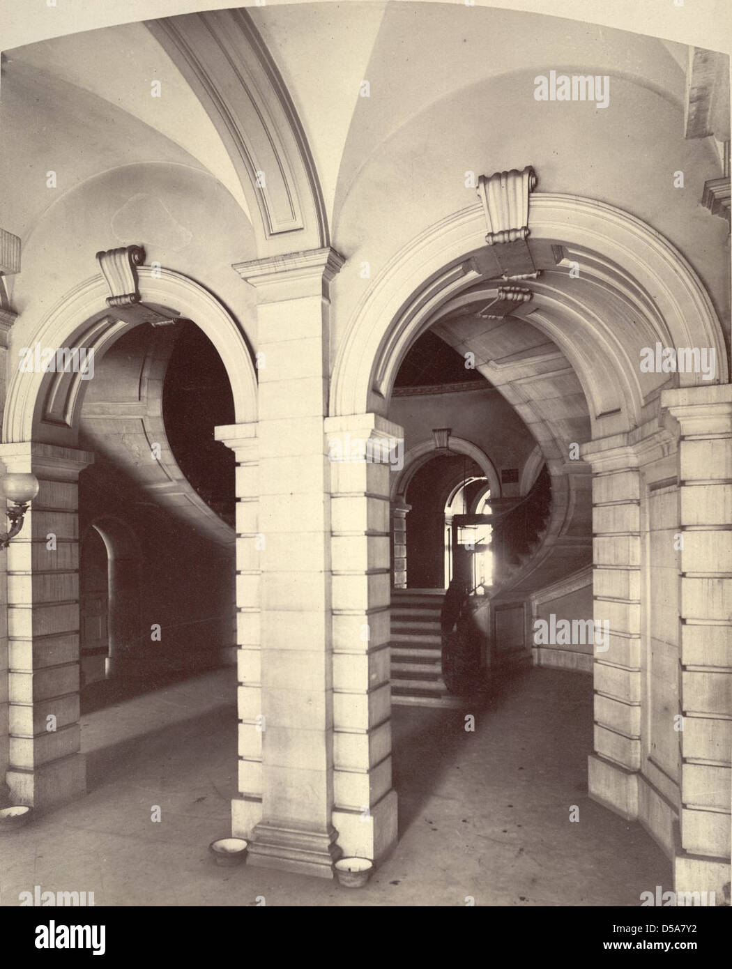 A photograph of the rotunda at New York City Hall, featuring the grand ...